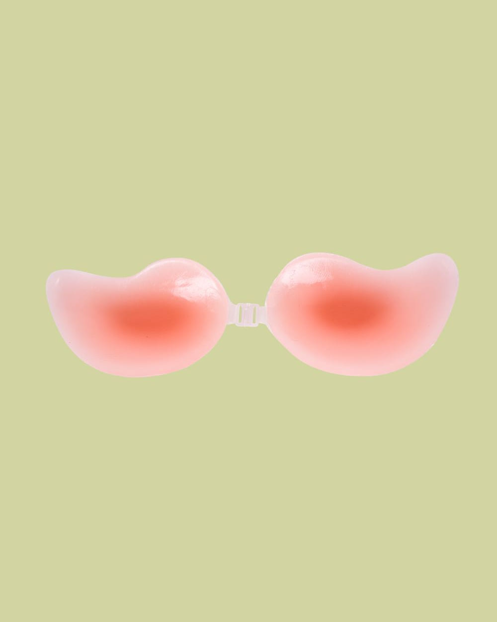 The Nudori Mango Silicone Bra opened flat, the curved mango cups joined by the clear MagLock clasp.
